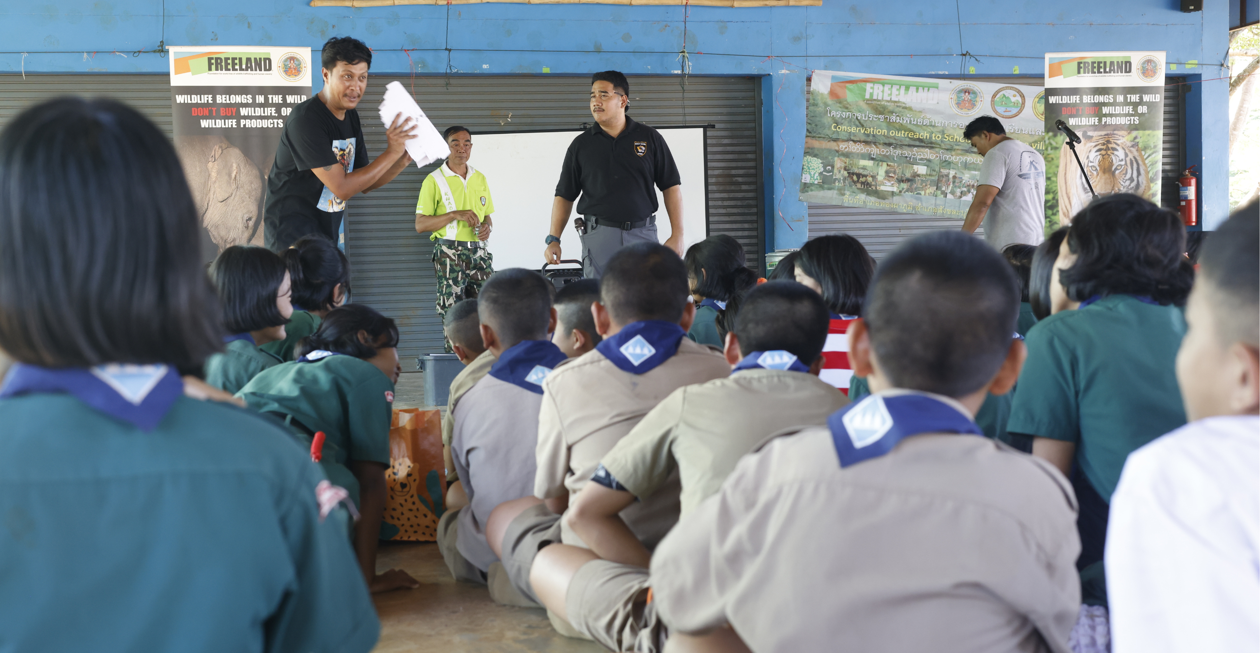 Thailand's DNP rangers and Freeland conducting community outreach