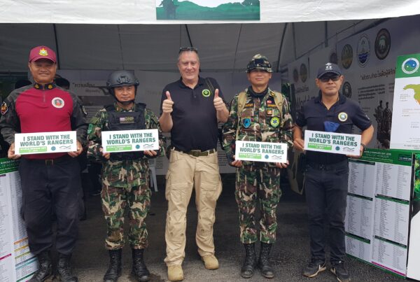 Freeland's Surviving Together Program Director with rangers and officials from the DNP