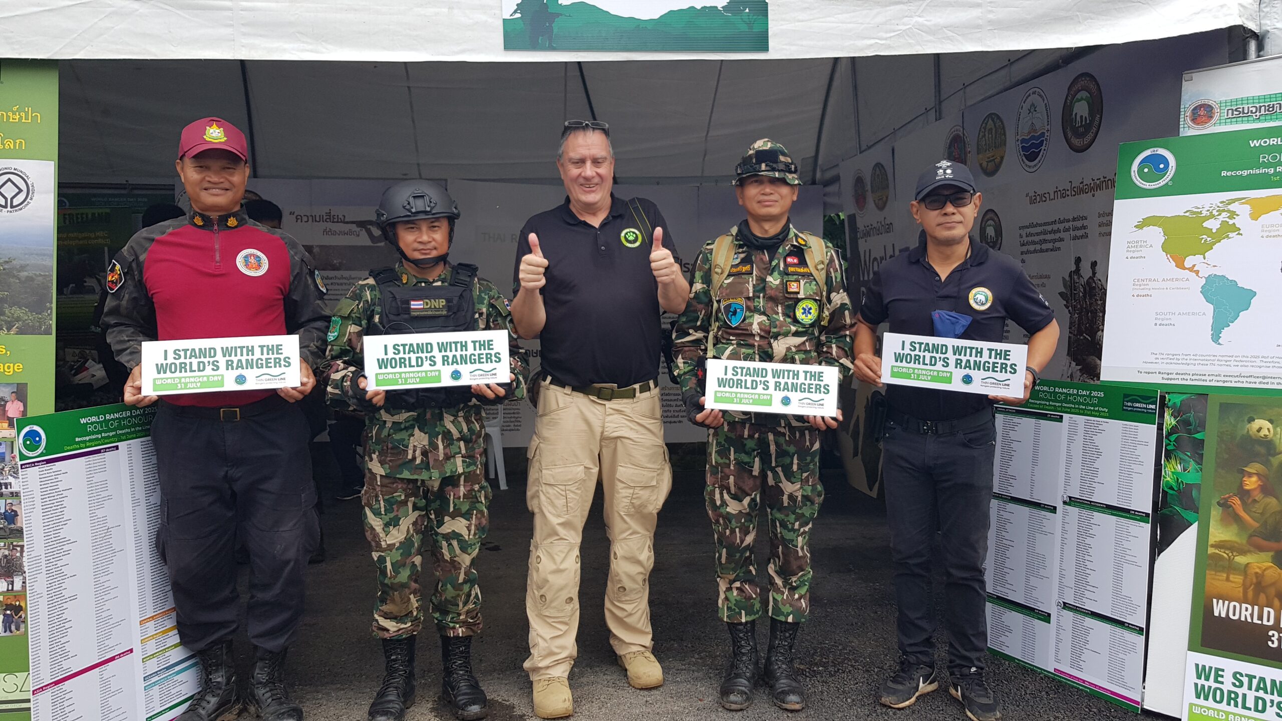 Freeland's Surviving Together Program Director with rangers and officials from the DNP